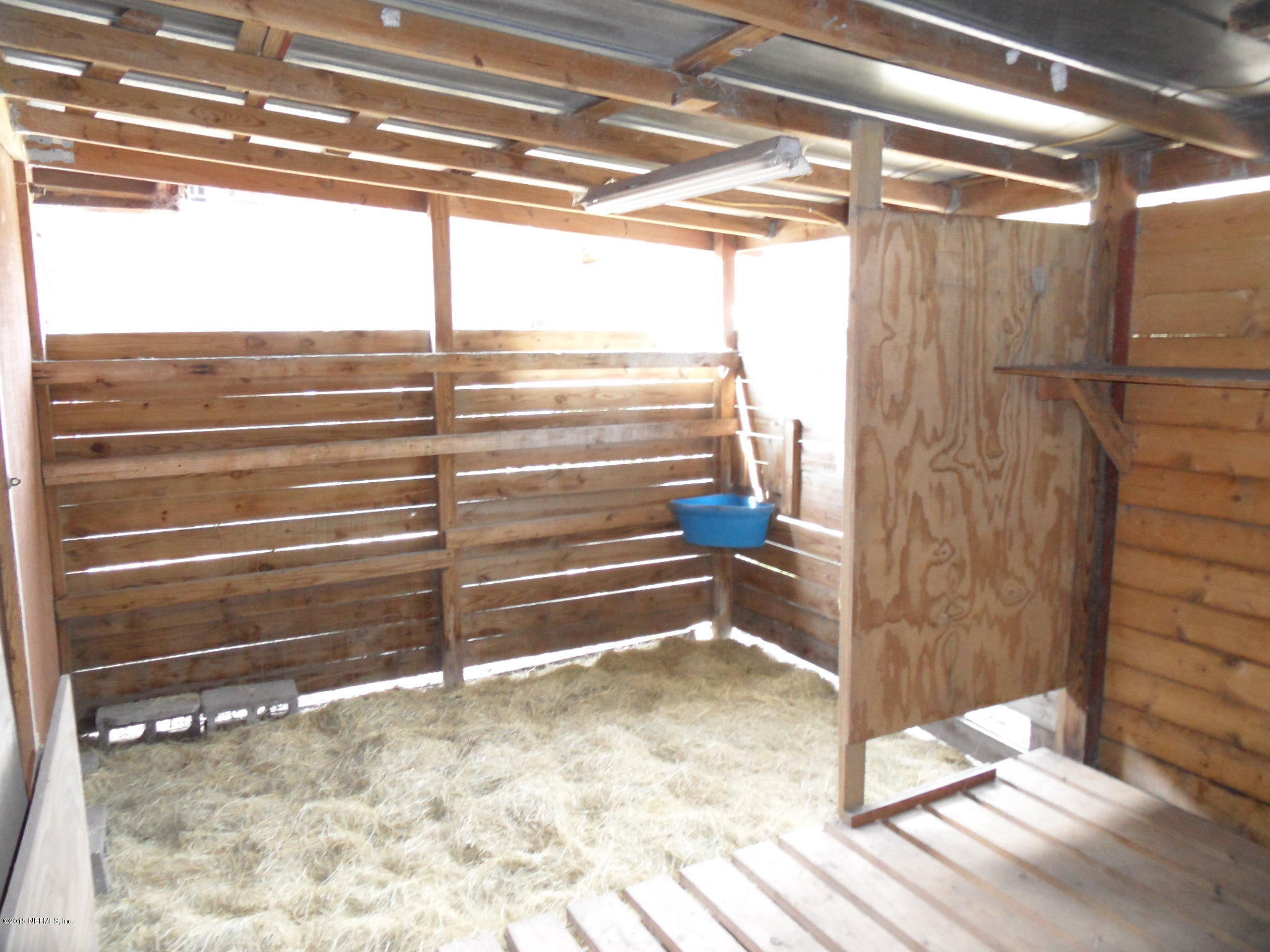 2873 Eagle Point Road Middleburg, FL 32068 - Photo 42 of 50 Inside of stall attached to tack room