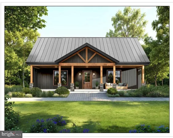 a front view of house with yard and outdoor seating