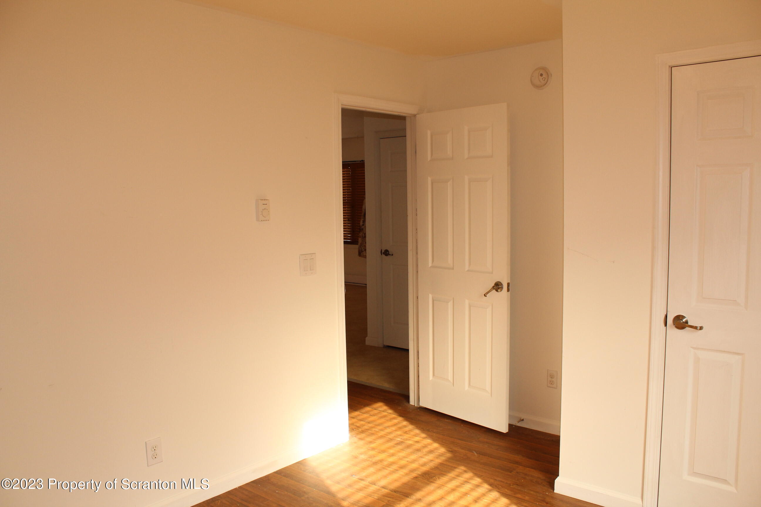 23 Delany Drive Tunkhannock, PA 18657 - Photo 7 of 8 a view of a bedroom with wooden floor