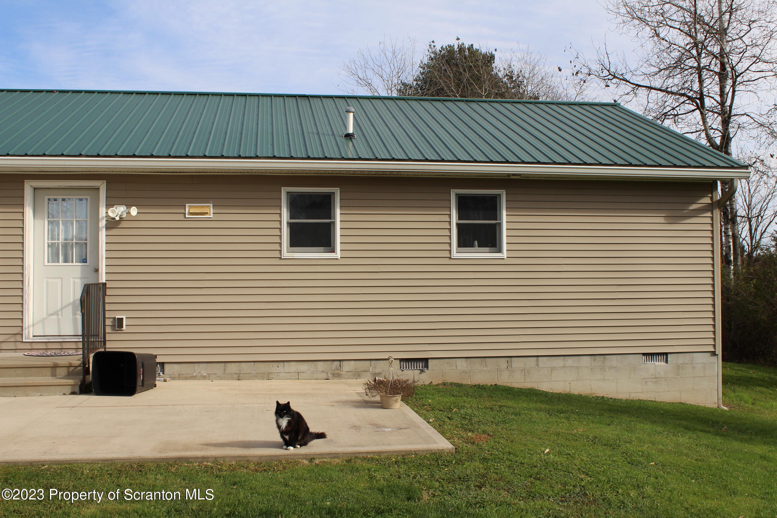 23 Delany Drive Tunkhannock, PA 18657 - Photo 8 of 8 a front view of a house with a yard