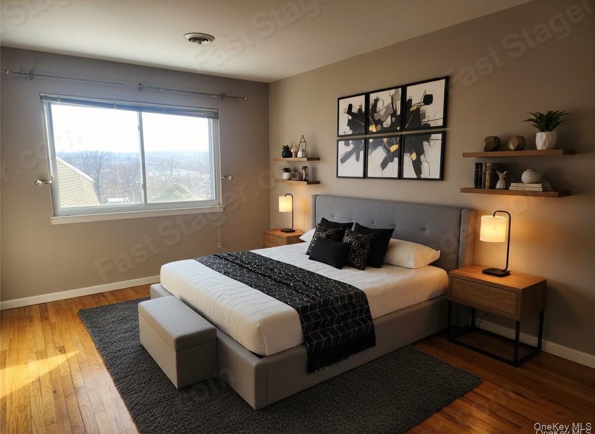 18 Pavilion Ridge Way, Unit 1 Suffern, NY 10901 - Photo 11 of 16 a bedroom with a bed and a window