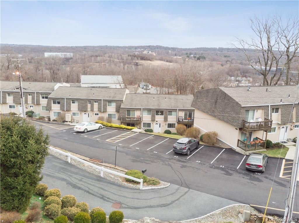 18 Pavilion Ridge Way, Unit 1 Suffern, NY 10901 - Photo 2 of 15 a view of a city with lawn chairs