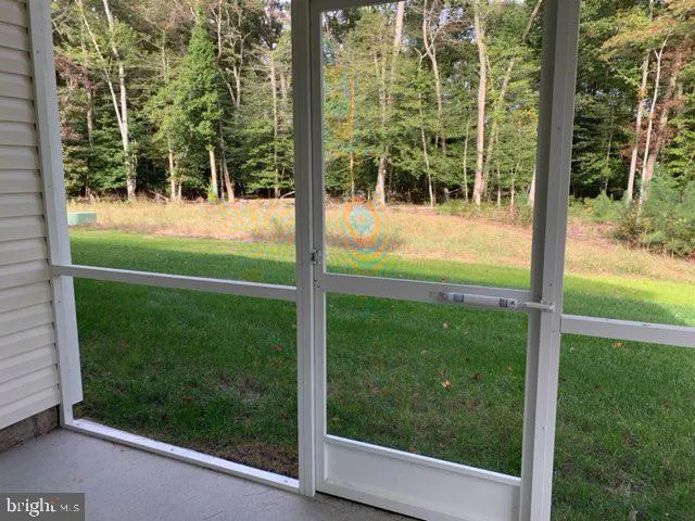 a view of a room and window