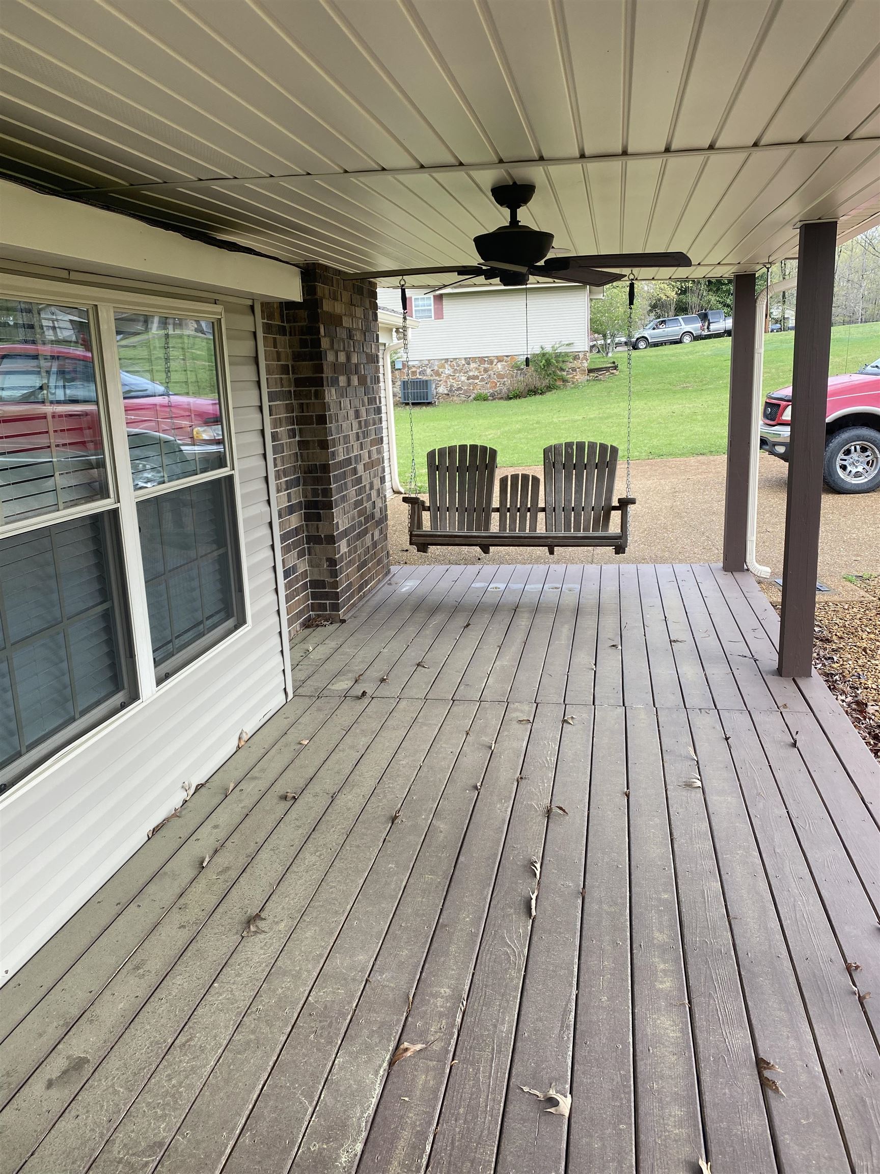 629 Hillside Drive Adamsville, TN 38310 - Photo 4 of 35 a view of a patio with wooden floor