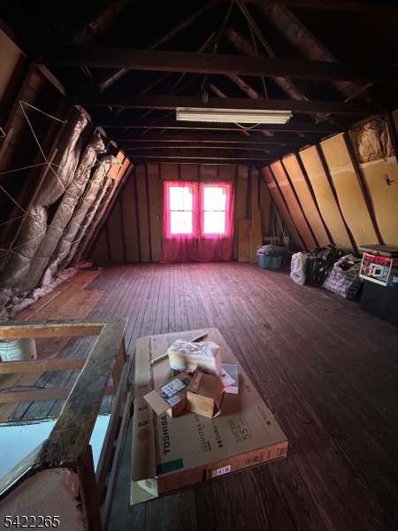 14 Helen Place Newark, NJ 07106 - Photo 7 of 11 a view of an empty room with wooden floor and windows