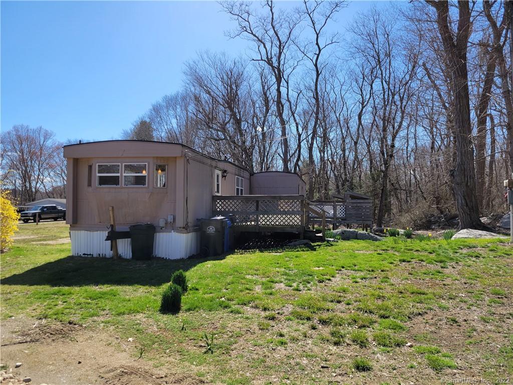 125 Whalehead Road, Unit 1 Ledyard, CT 06335 - Photo 1 of 1 Front and left side.