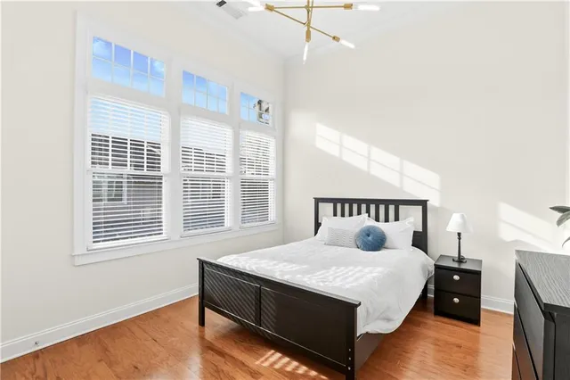 a bathroom with a bathtub sink vanity and mirror