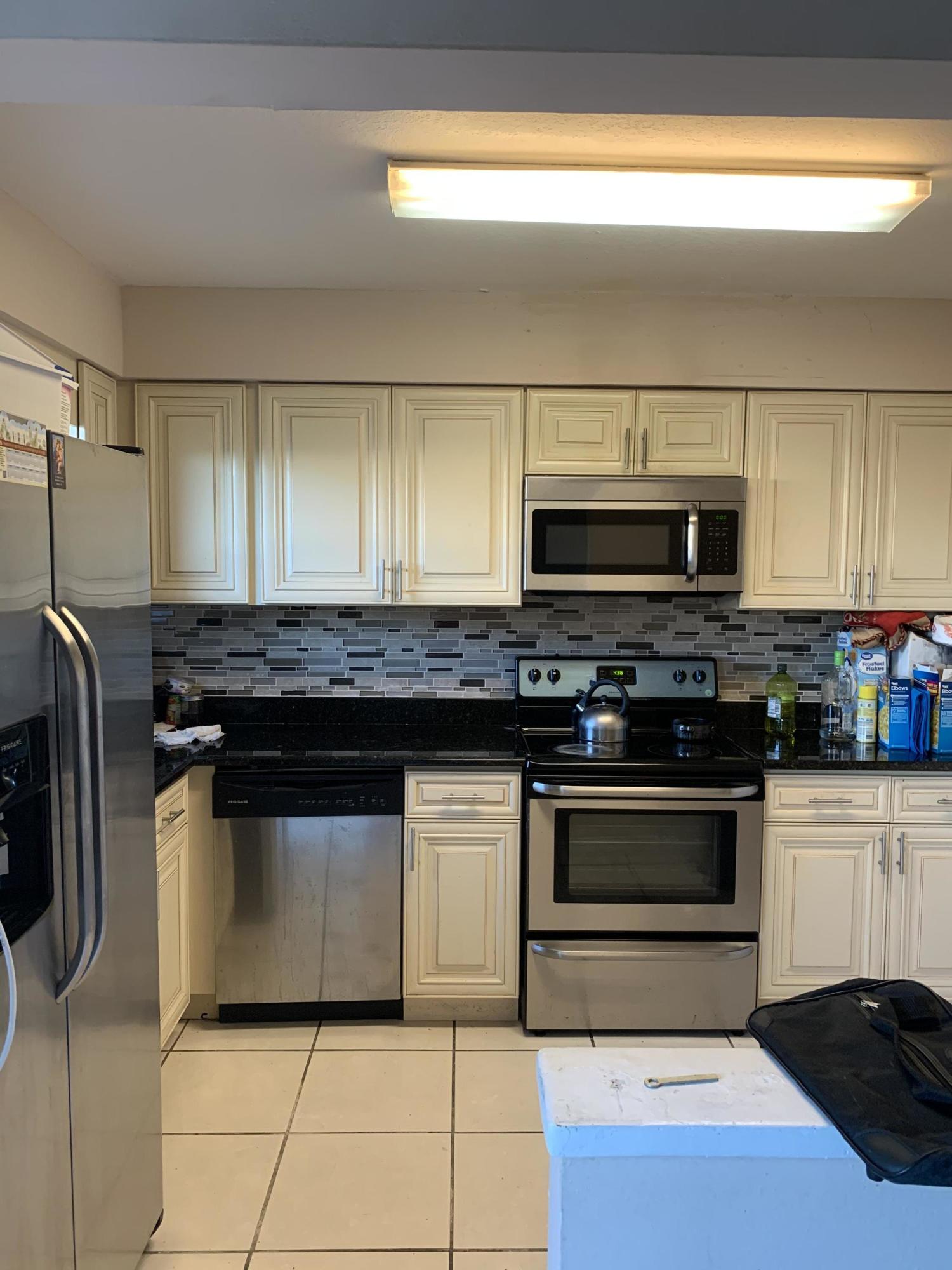1102 Riverside Drive Greenacres, FL 33463 - Photo 1 of 8 A0B16639-7F93-48F2-9598-27EE8FDCB6E7