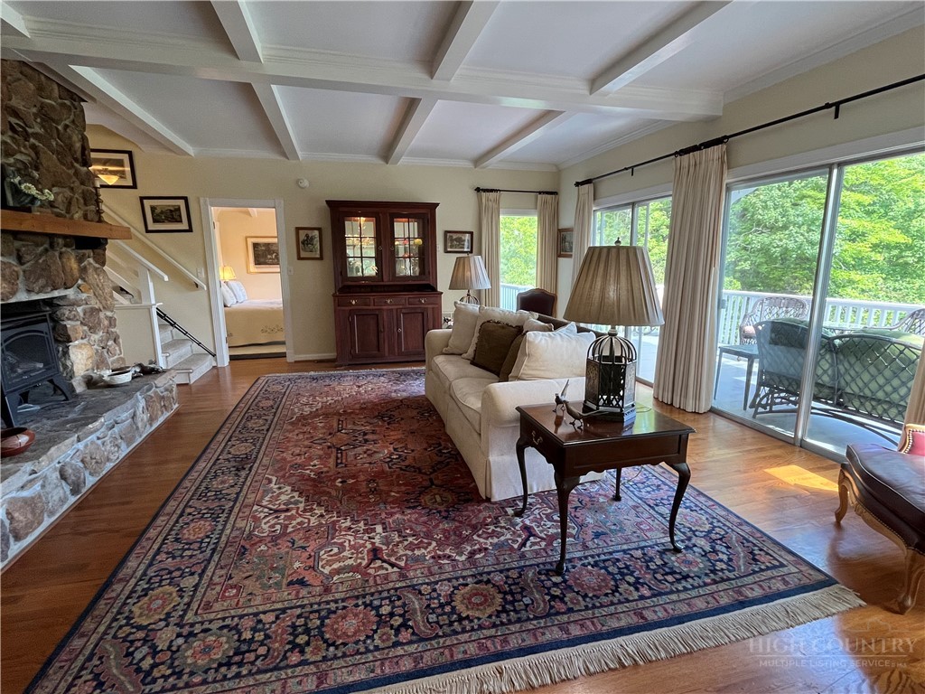 638 Ridge Road Glade Valley, NC 28627 - Photo 6 of 44 a living room with furniture and a rug