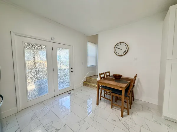 a room with furniture and a window