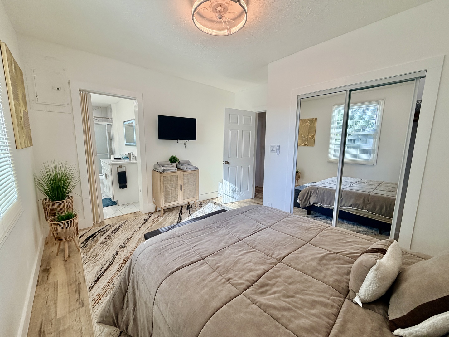 1112 Ophia Street Metropolis, IL 62960 - Photo 19 of 32 a bedroom with a bed and a flat tv screen