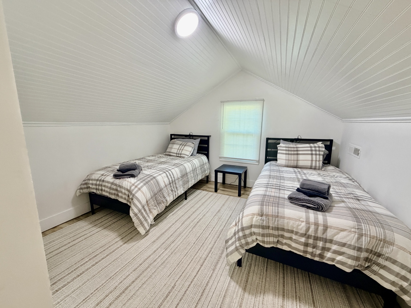 1112 Ophia Street Metropolis, IL 62960 - Photo 26 of 32 a bedroom with a bed and wooden floor