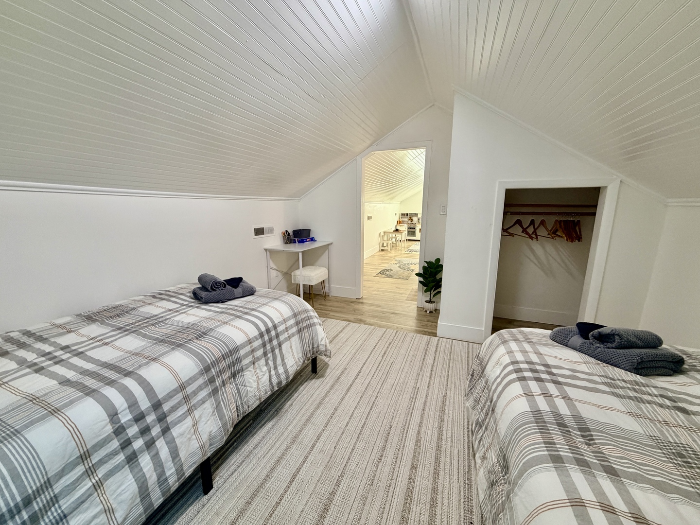 1112 Ophia Street Metropolis, IL 62960 - Photo 27 of 32 a bedroom with a bed and wooden floor
