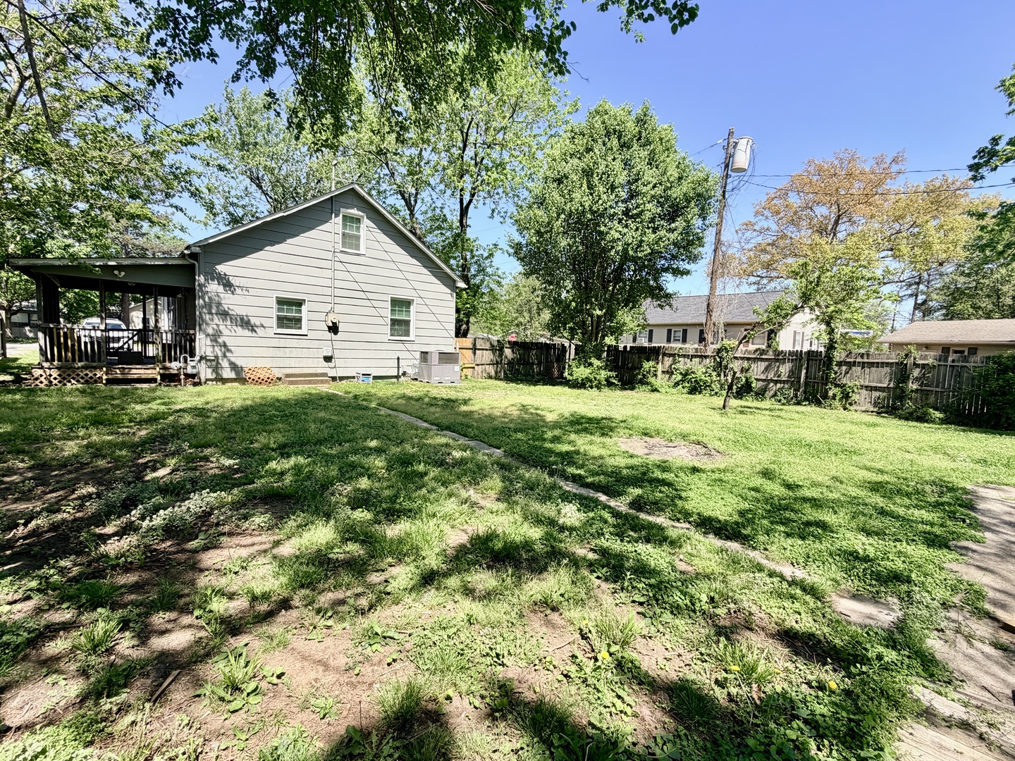 1112 Ophia Street Metropolis, IL 62960 - Photo 6 of 32 a view of a house with a yard