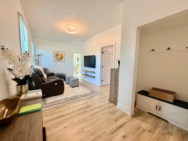 a bed room with a bed and a tv