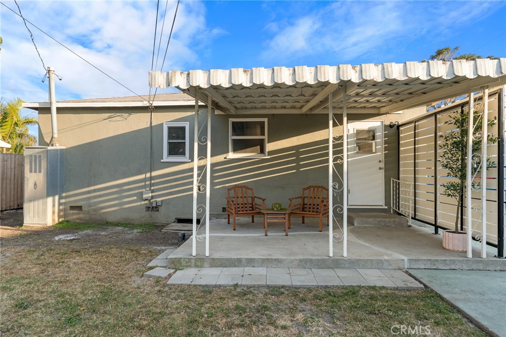 5027 West 135th Street Hawthorne, CA 90250 - Photo 16 of 24 a view of a porch with a bench