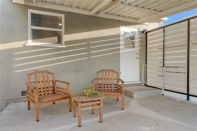 a view of a room that has a bench in it