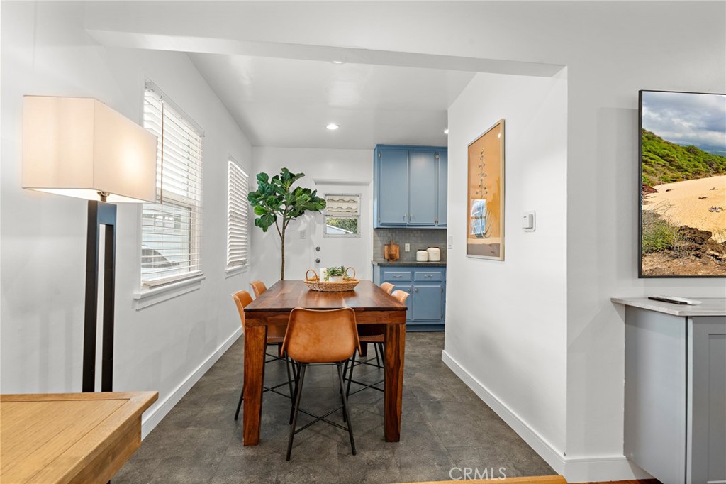 5027 West 135th Street Hawthorne, CA 90250 - Photo 5 of 24 a view of a dining room with furniture and a window