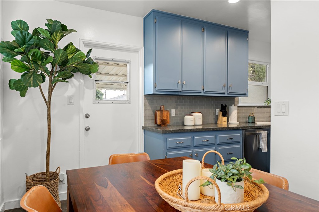 5027 West 135th Street Hawthorne, CA 90250 - Photo 6 of 24 a dining room with wooden floor