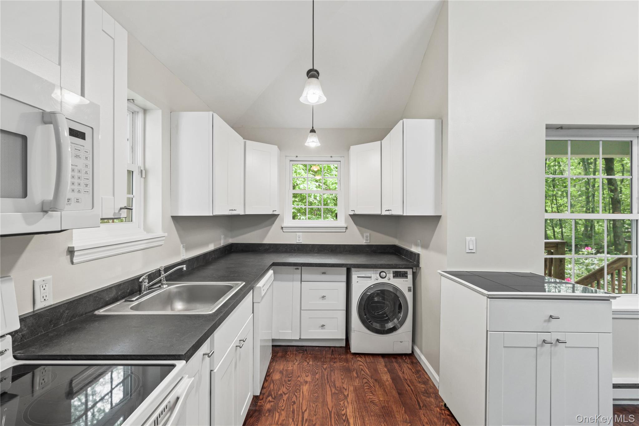 333 Wixon Pond Road Mahopac, NY 10541 - Photo 5 of 18 Alternate view of the kitchen with a brand new ventless combination washer/dryer LG unit.