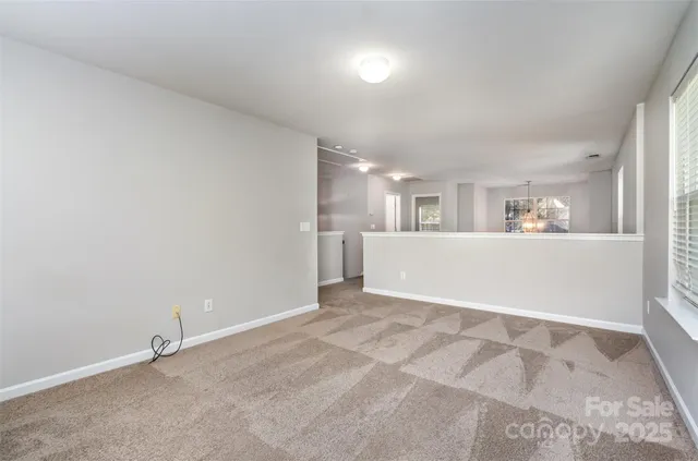 a view of a kitchen with a sink