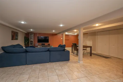 a living room with furniture and a table