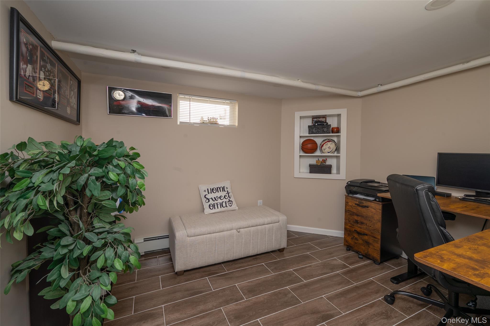 211 Gardner Avenue Jericho, NY 11753 - Photo 27 of 36 a living room with furniture and a flat screen tv