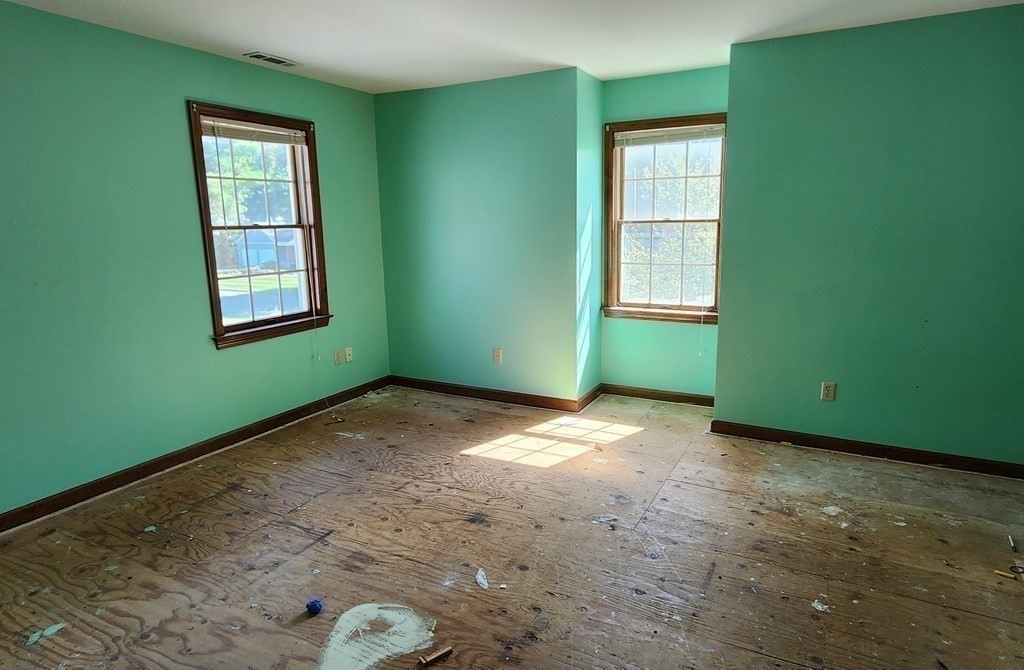 12 Woodsley Road Wilbraham, MA 01095 - Photo 13 of 15 a view of an empty room with window and carpet