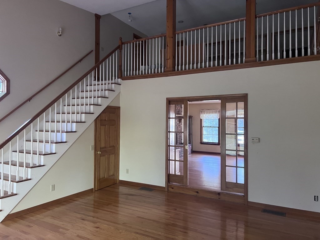 12 Woodsley Road Wilbraham, MA 01095 - Photo 9 of 15 a view of entryway with stairs and wooden floor