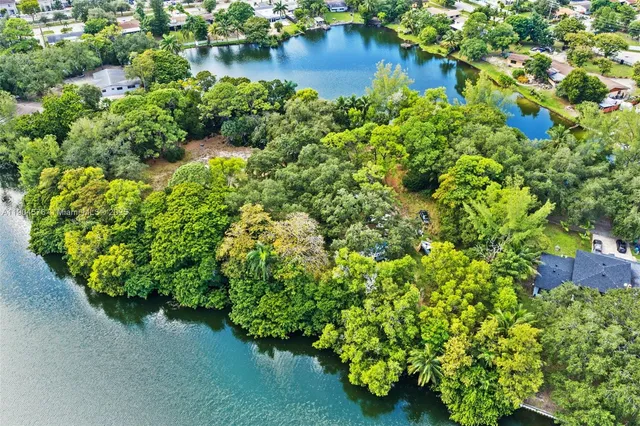 a view of a lake with a big yard