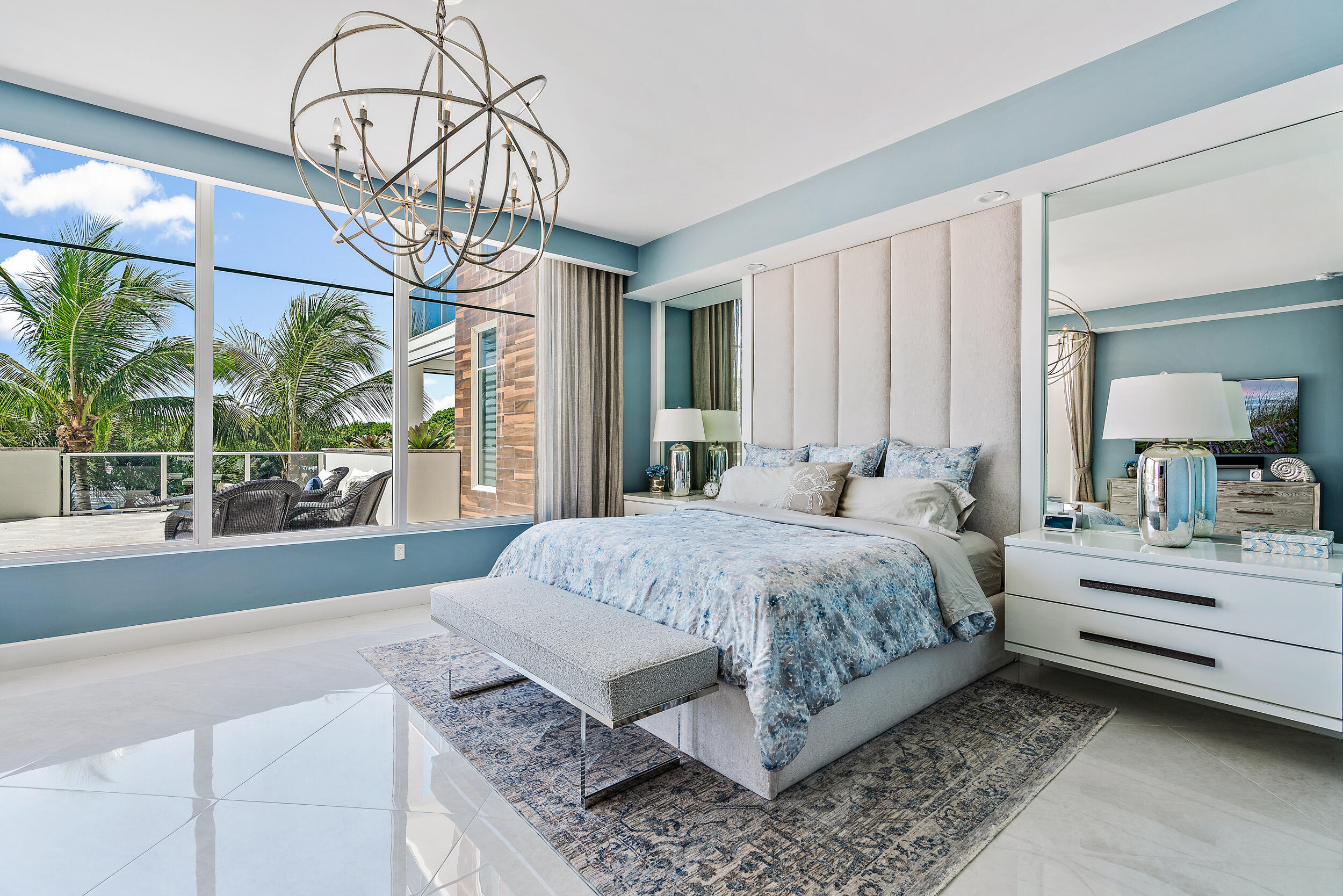 2720 Donald Ross Road, Unit 203 Palm Beach Gardens, FL 33410 - Photo 11 of 35 a bedroom with a bed chandelier and window