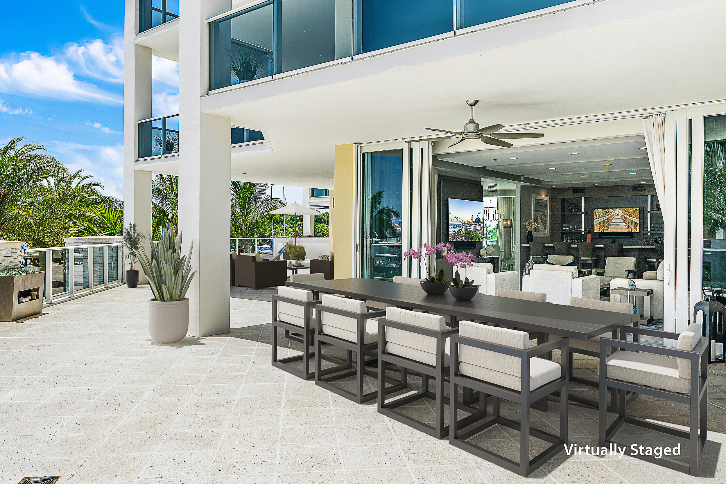 2720 Donald Ross Road, Unit 203 Palm Beach Gardens, FL 33410 - Photo 16 of 35 a view of a patio with dining table and chairs