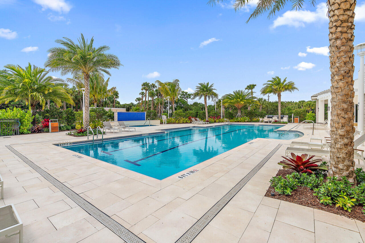 2720 Donald Ross Road, Unit 203 Palm Beach Gardens, FL 33410 - Photo 19 of 35 a view of swimming pool with a patio