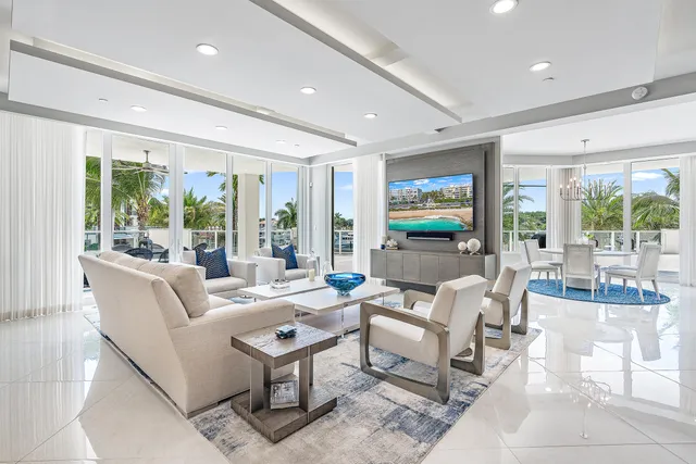 a living room with fireplace furniture and a flat screen tv