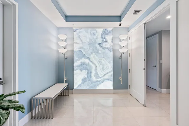 a view of a bathroom with tub and shower