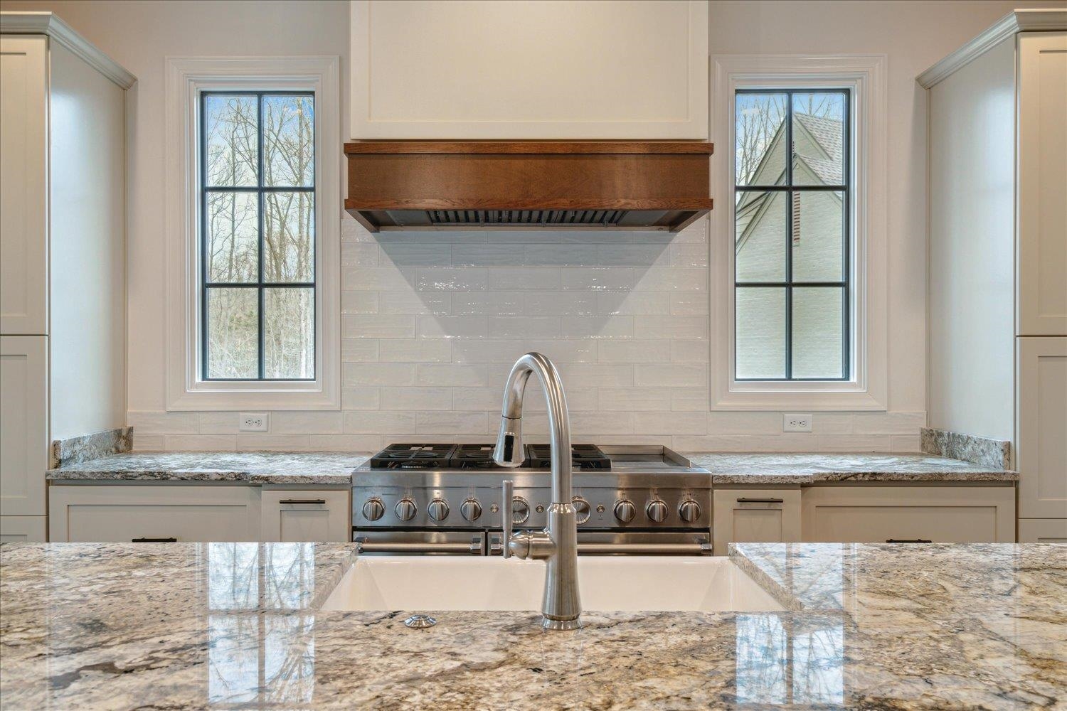 45 Magnolia Cove Piperton, TN 38017 - Photo 16 of 40 a kitchen with a sink and a cabinets