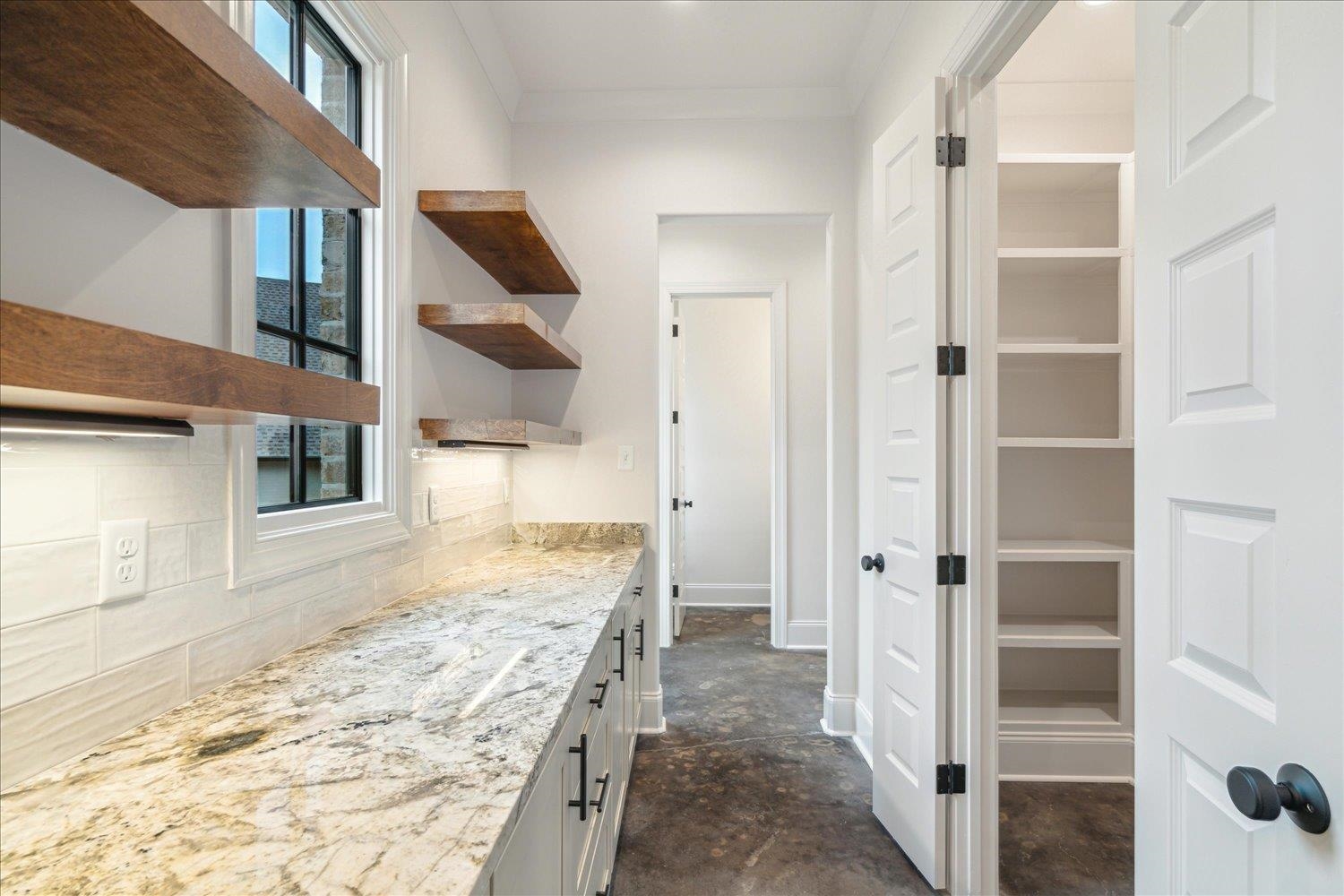 45 Magnolia Cove Piperton, TN 38017 - Photo 18 of 40 a bathroom with a granite countertop sink and glass door
