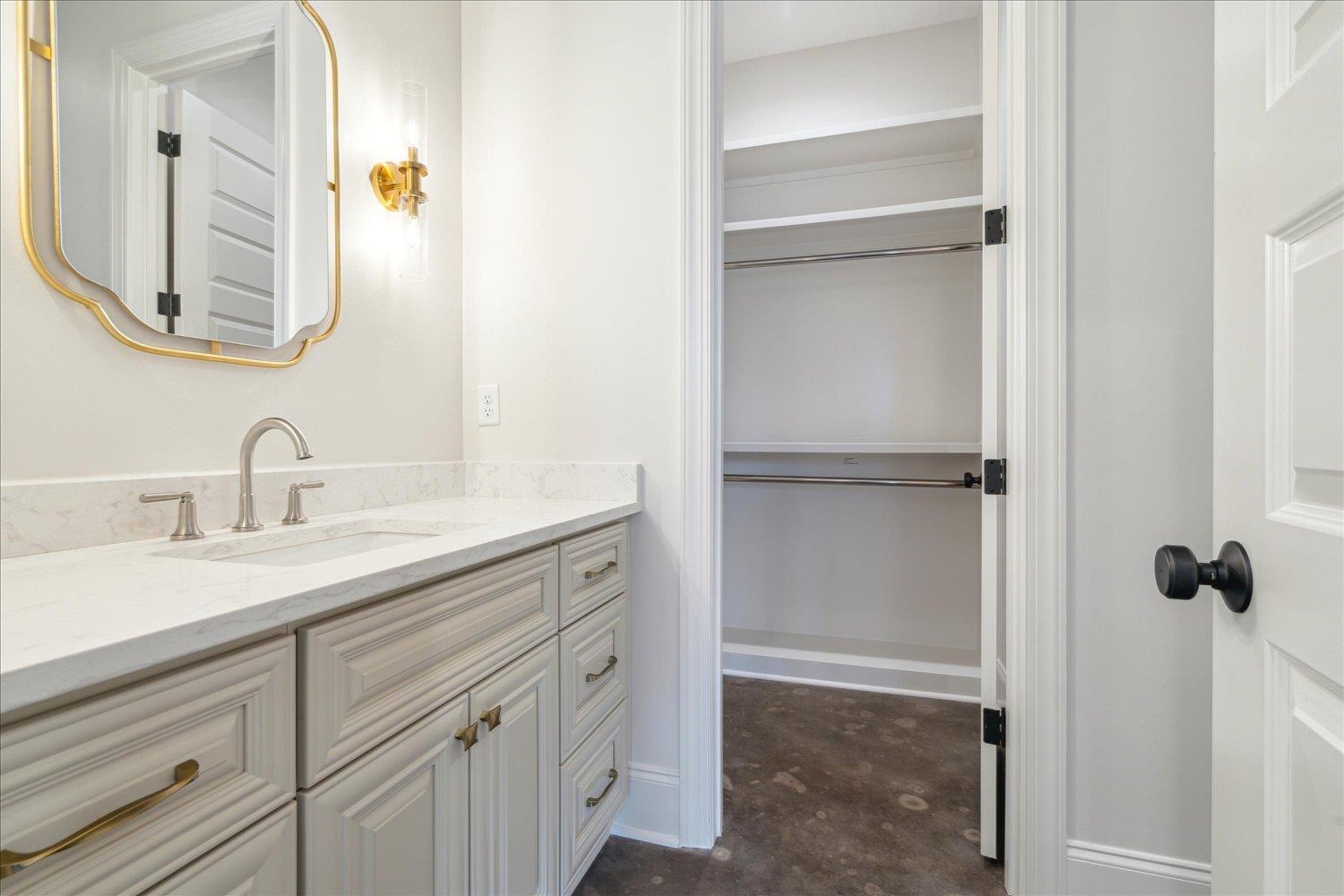 45 Magnolia Cove Piperton, TN 38017 - Photo 28 of 40 a bathroom with a sink and a mirror