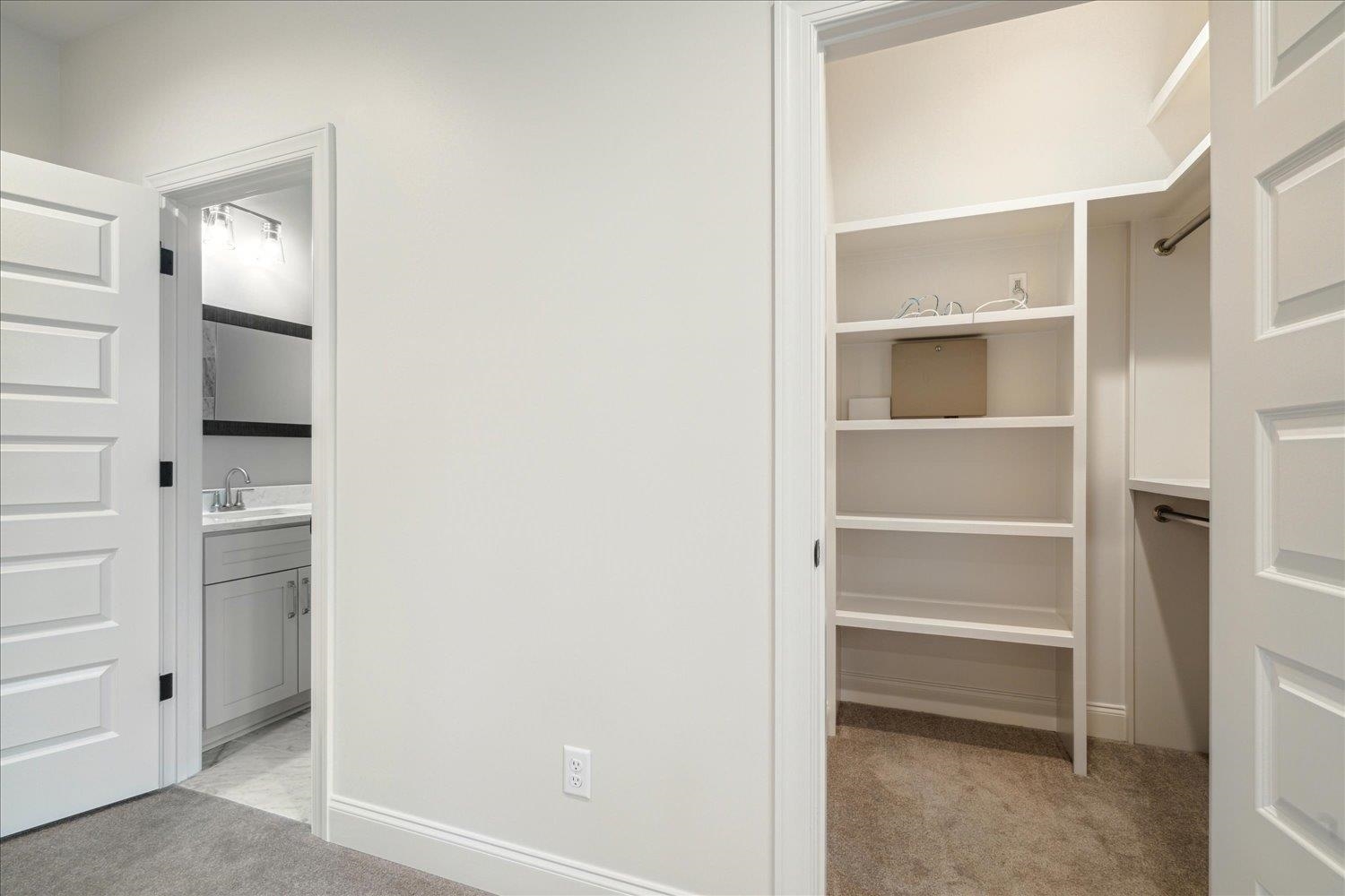 45 Magnolia Cove Piperton, TN 38017 - Photo 35 of 40 a view of walk in closet with empty racks