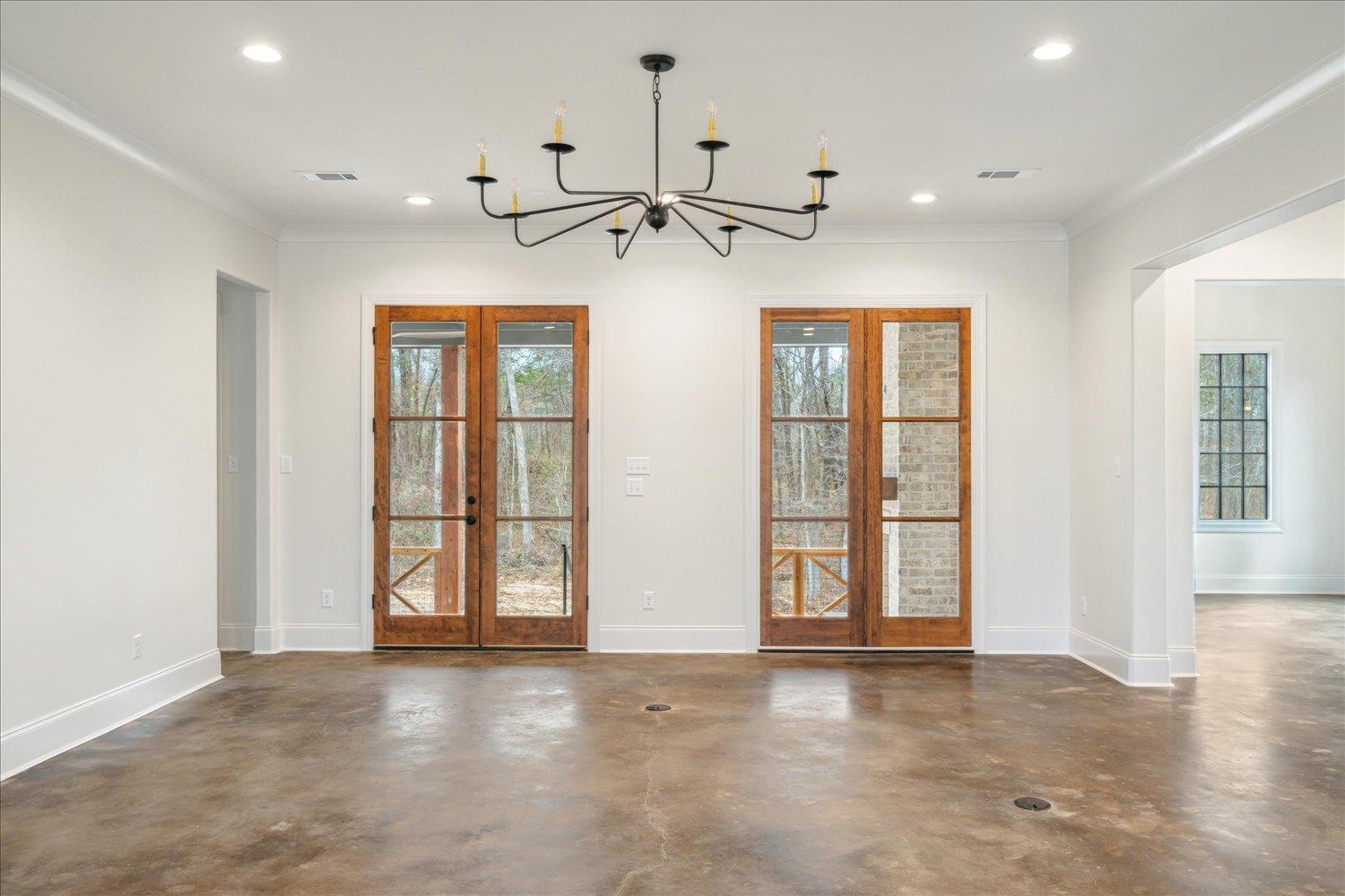 45 Magnolia Cove Piperton, TN 38017 - Photo 8 of 40 an empty room with windows and ceiling fan