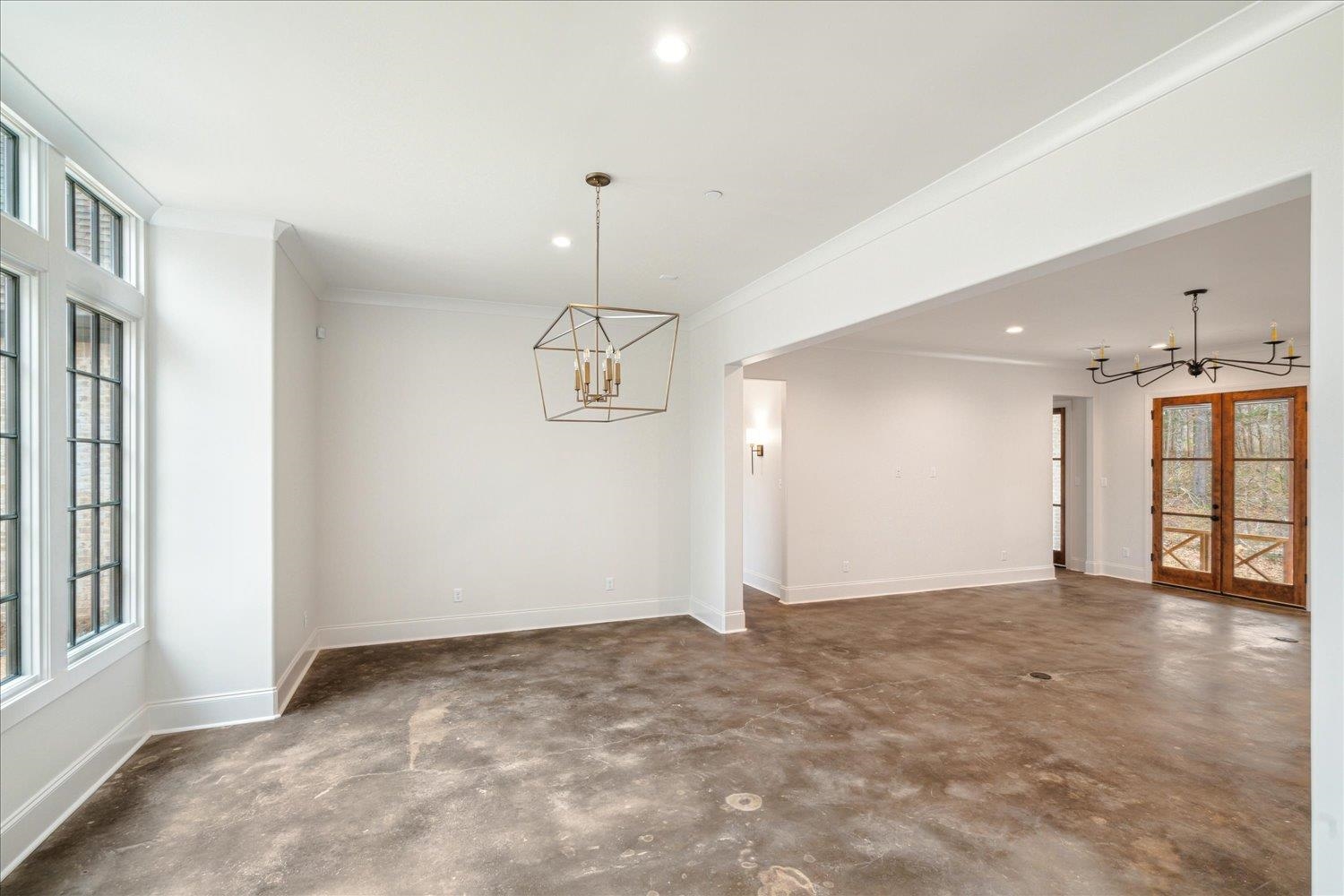 45 Magnolia Cove Piperton, TN 38017 - Photo 10 of 40 a view of an empty room with window and chandelier