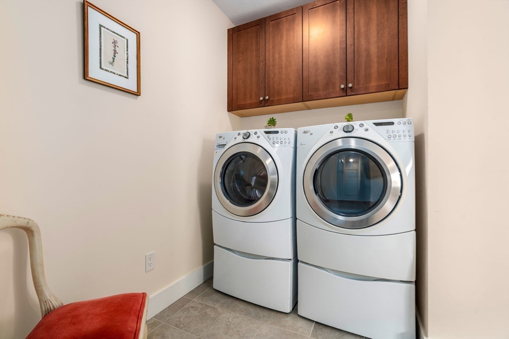 69 Abbey Road, Unit 69 Westwood, MA 02090 - Photo 11 of 16 a utility room with dryer and washer