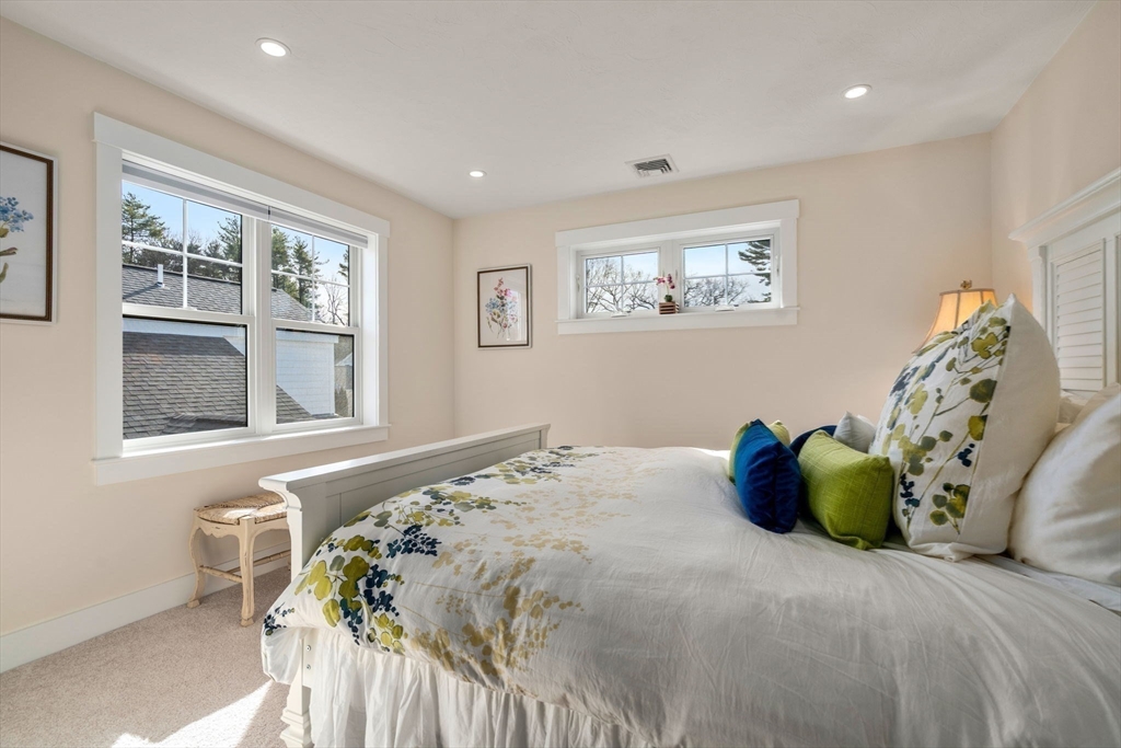 69 Abbey Road, Unit 69 Westwood, MA 02090 - Photo 12 of 16 a bedroom with a bed and window
