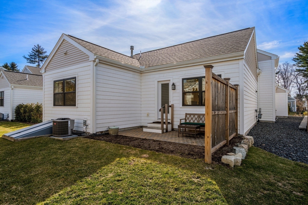 69 Abbey Road, Unit 69 Westwood, MA 02090 - Photo 16 of 16 a front view of house with yard