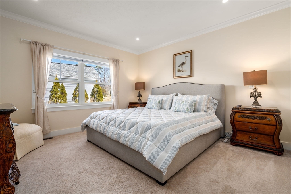 69 Abbey Road, Unit 69 Westwood, MA 02090 - Photo 6 of 16 a bedroom with a bed and a window