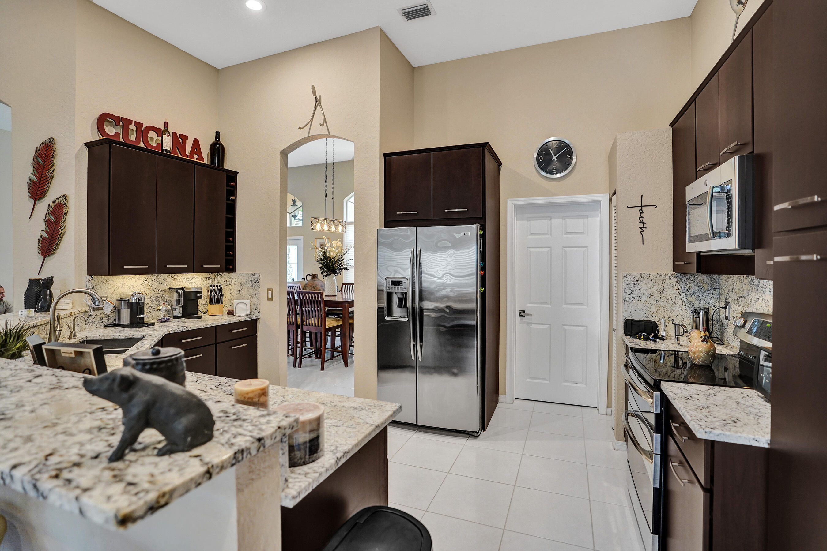 10063 Umberland Place Boca Raton, FL 33428 - Photo 22 of 97 a living room with furniture and a flat screen tv