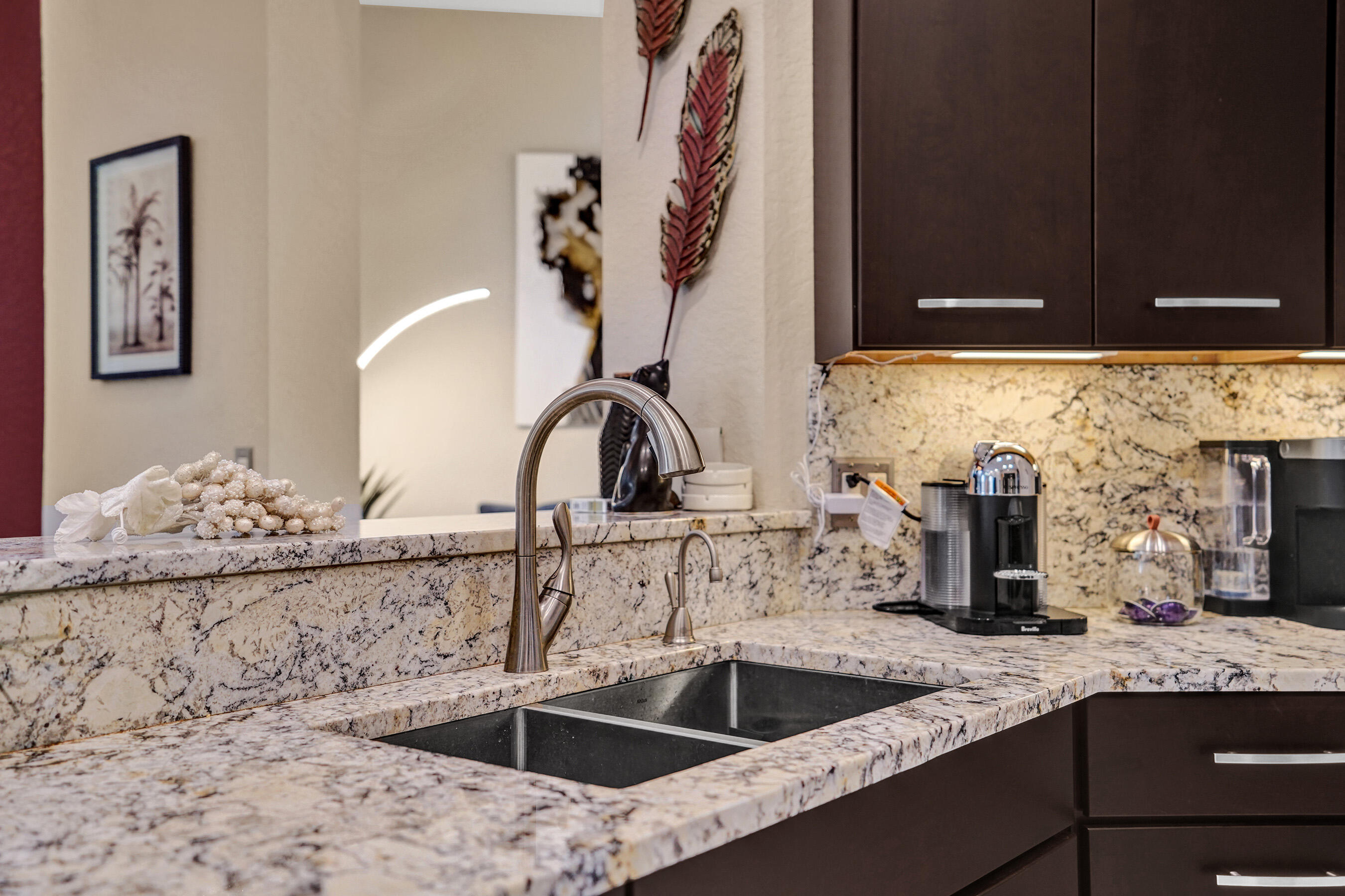 10063 Umberland Place Boca Raton, FL 33428 - Photo 30 of 97 a kitchen with a sink and cabinets