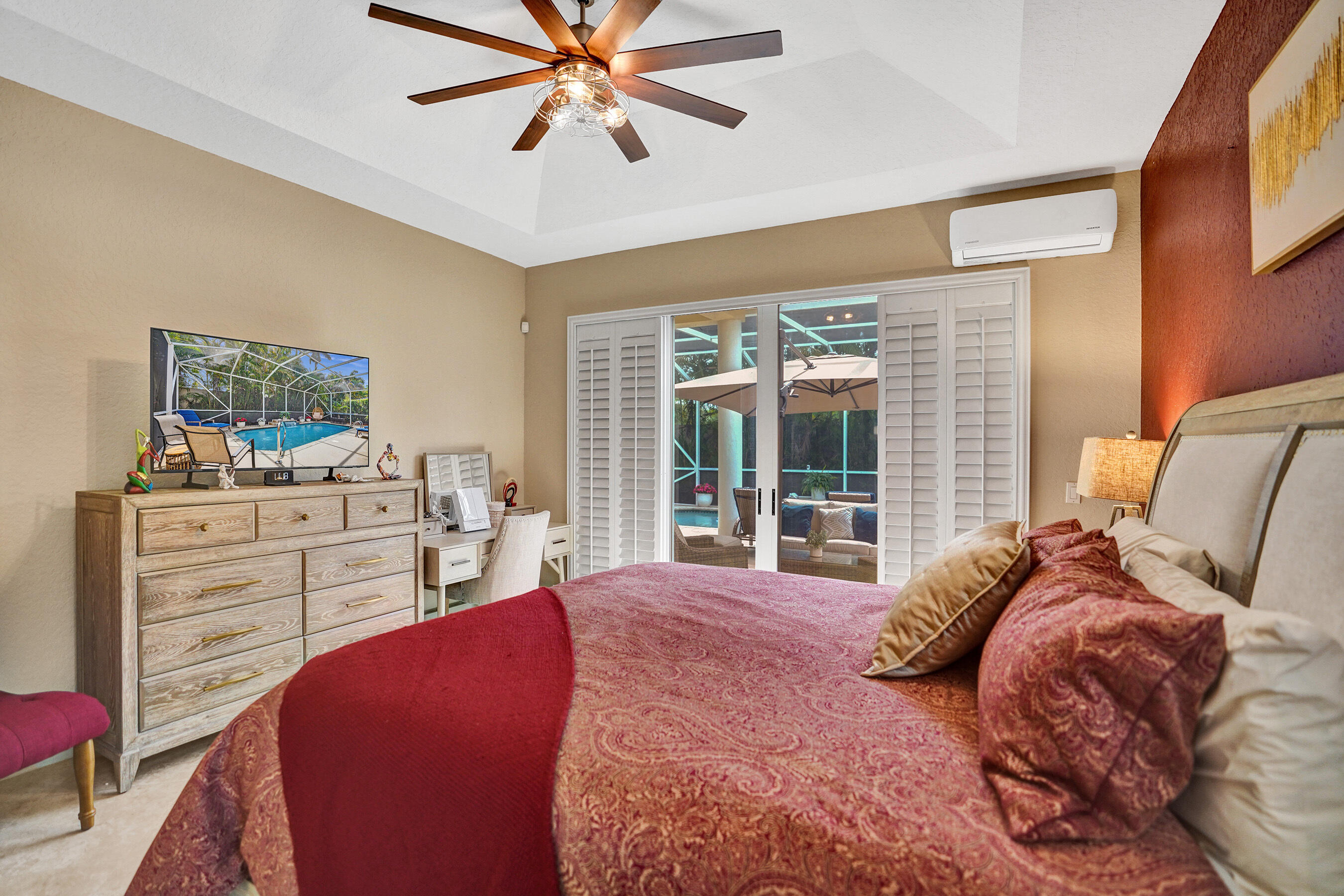 10063 Umberland Place Boca Raton, FL 33428 - Photo 38 of 97 a bedroom with a large bed and a window