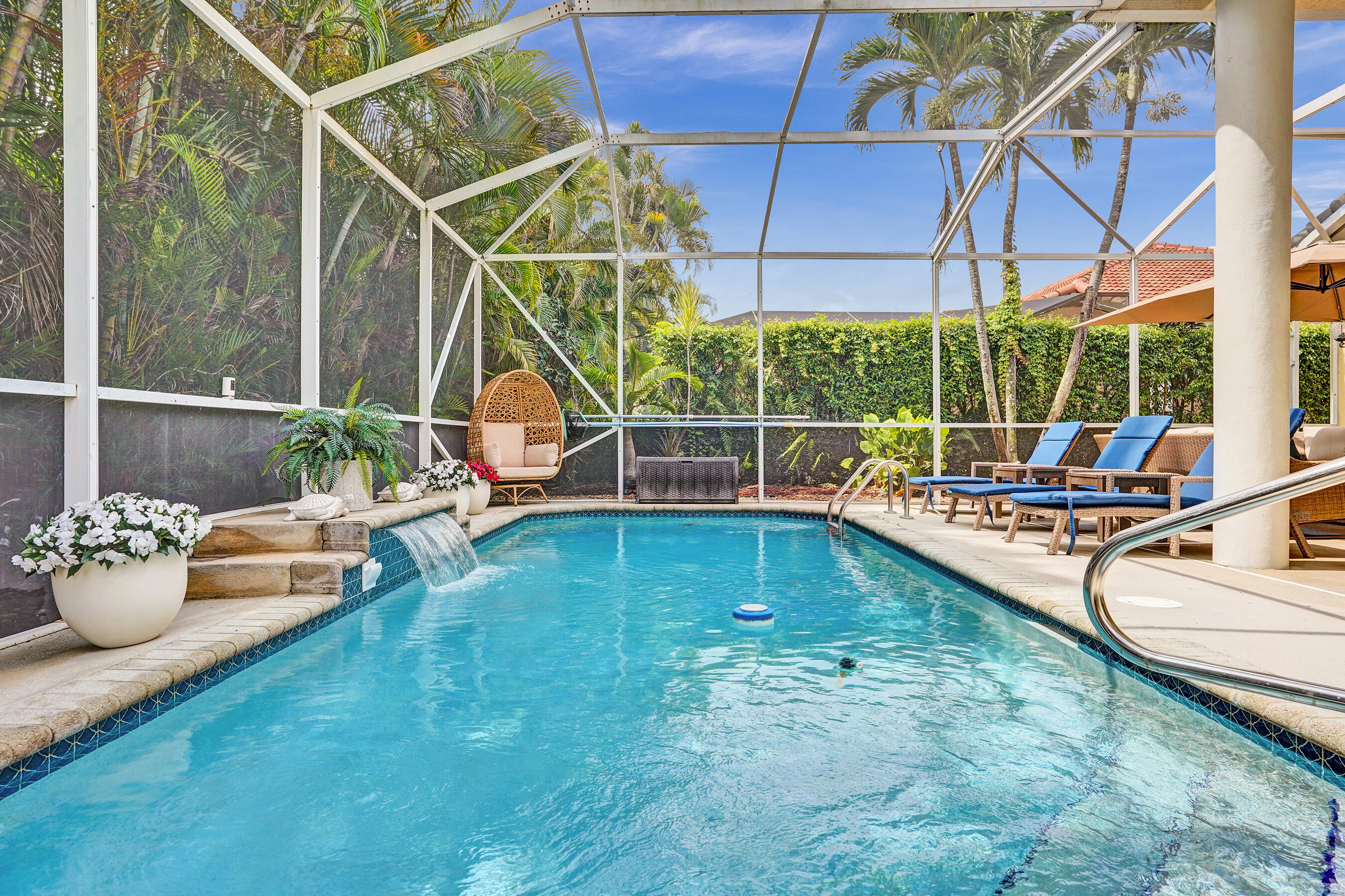 10063 Umberland Place Boca Raton, FL 33428 - Photo 90 of 97 a view of a backyard with swimming pool and sitting area