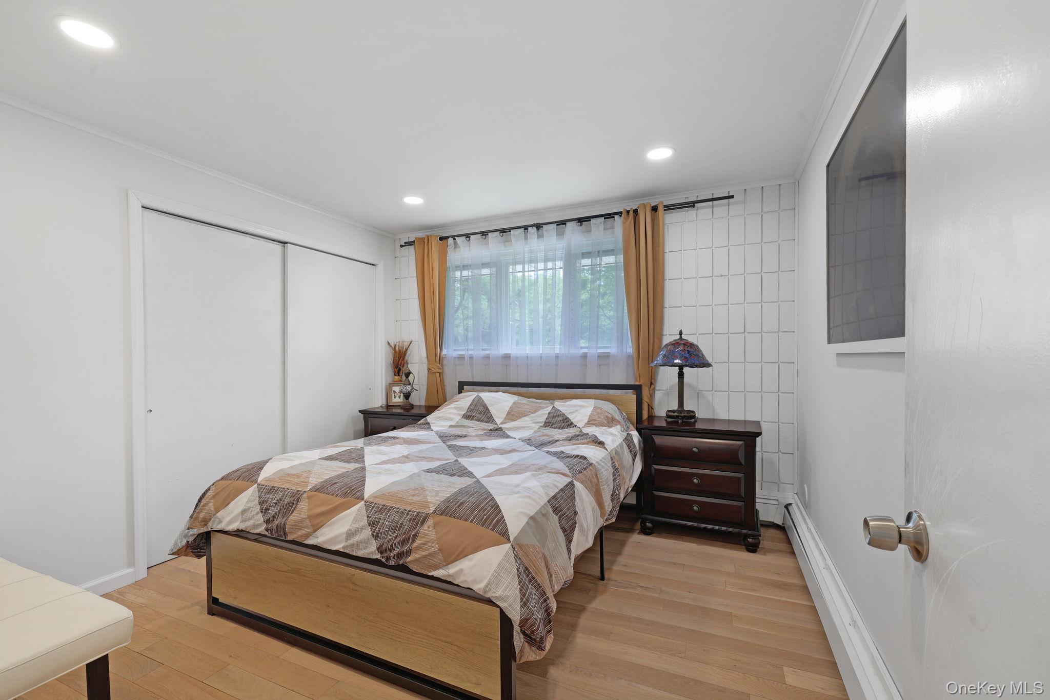 35 Kroeger Road Monticello, NY 12701 - Photo 11 of 29 a bedroom with a bed and a window